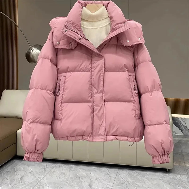 Women's insulated puffer jacket in neutral tones, streamlined silhouette for cozy everyday winter wear