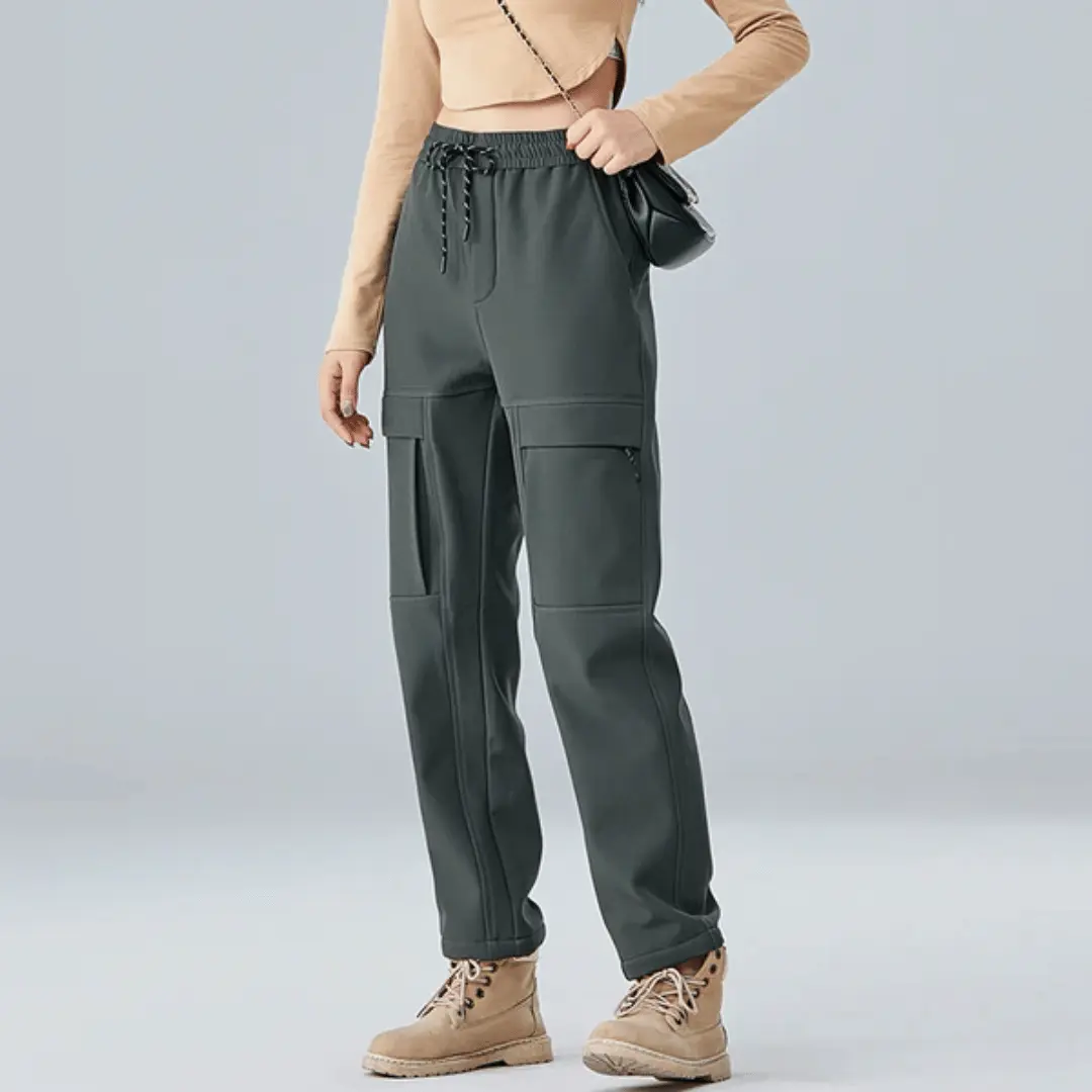 Men's weatherproof cargo pants with fleece lining, water-repellent shell, and adjustable waistband for outdoor use