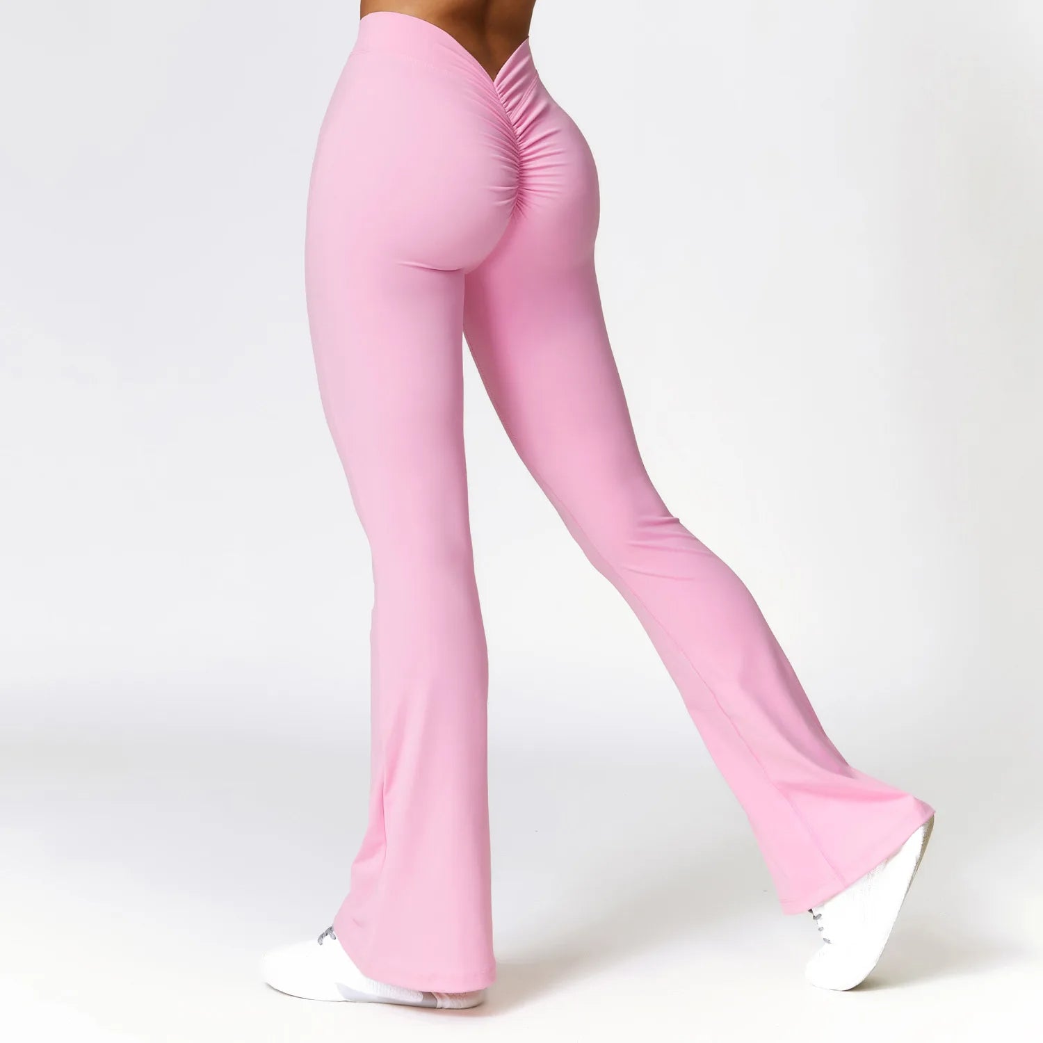 Black high-waisted flare yoga pants with elastic waistband, premium nylon spandex stretch fabric