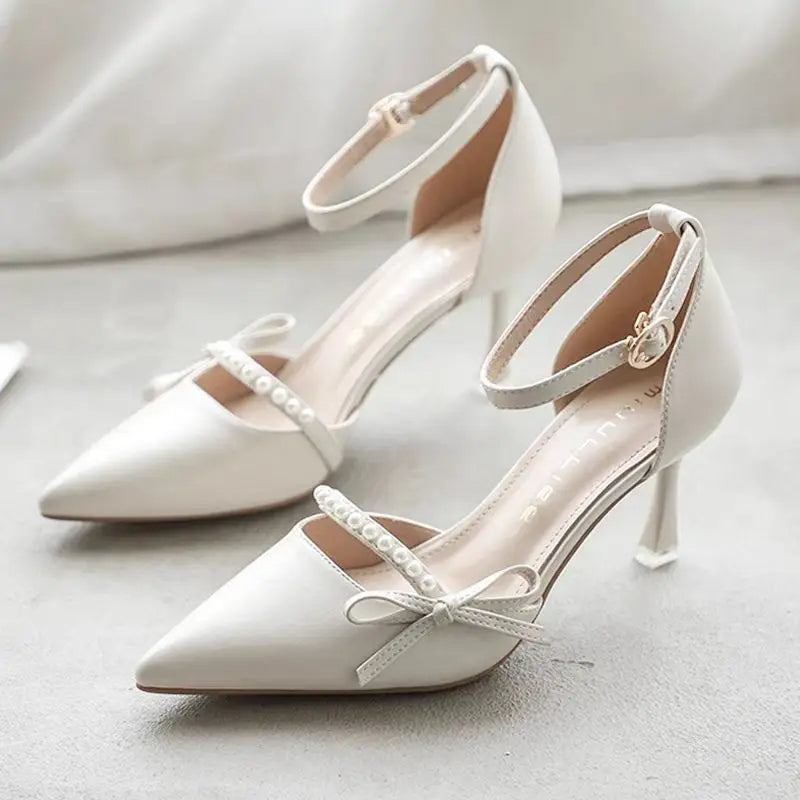 Women's vegan leather pump pearl bow embellishment cushioned adjustable strap heels