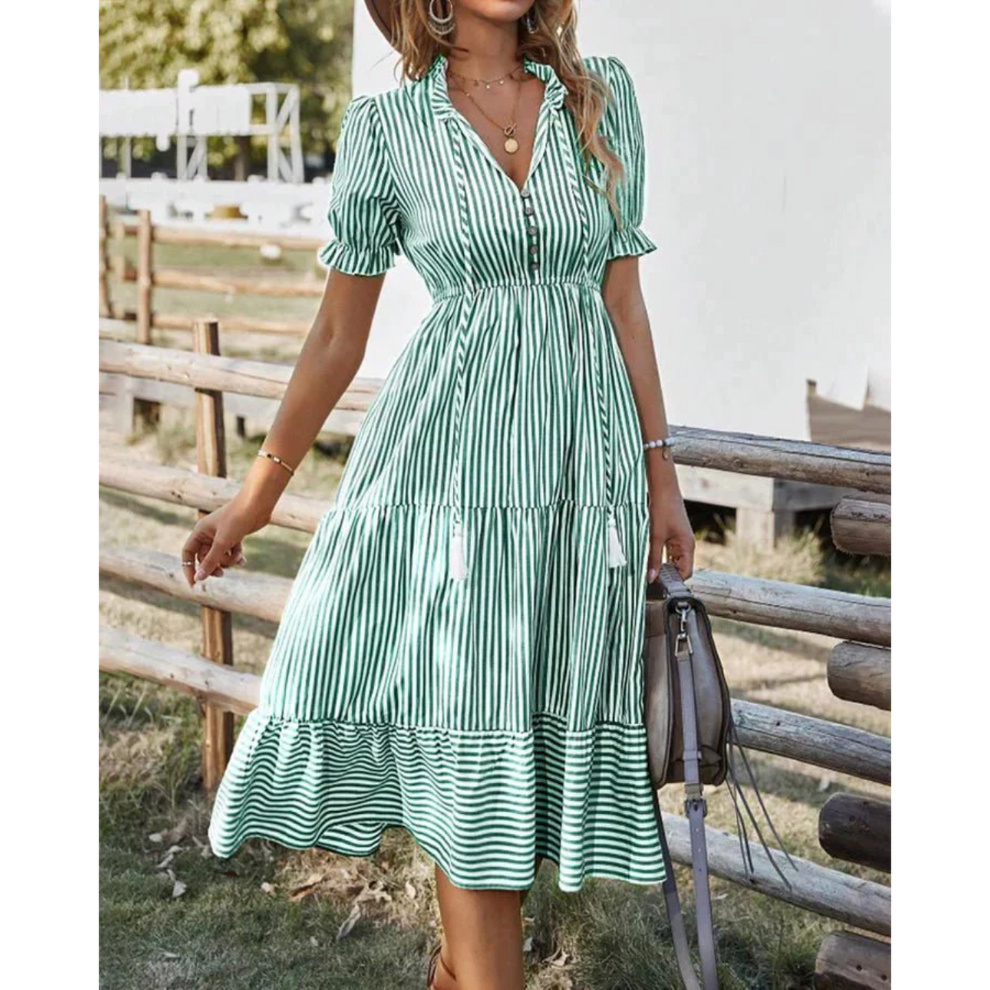 Women's striped midi dress with V-neck button closure, A-line silhouette and puff sleeves