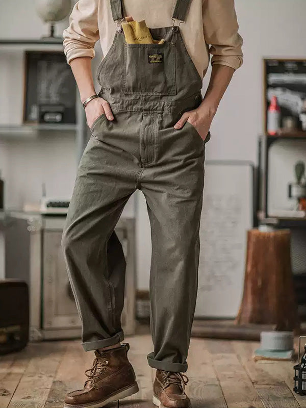 Vintage unisex canvas overalls jumpsuit in rustic tan, elastic straps, 100% cotton workwear style
