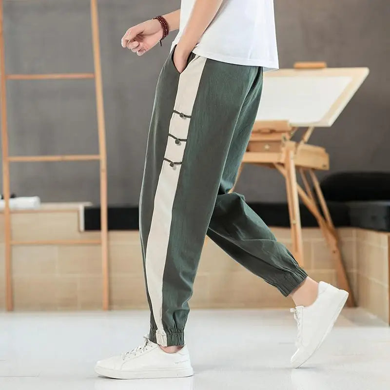 Men's lightweight track jogger pants relaxed fit with contrast side stripe and knot detail