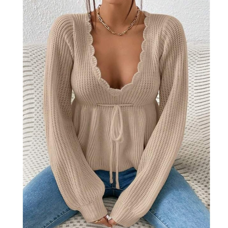 Women's soft knit top with scalloped neckline, tie-front waist detail, feminine everyday style