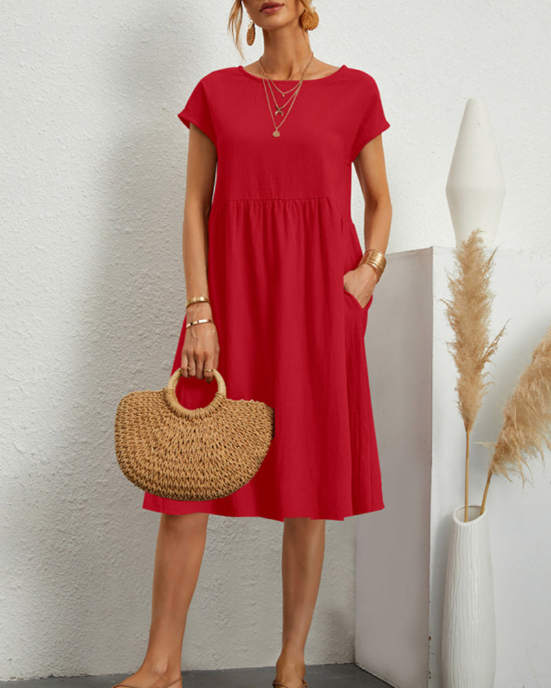 Women's round neck midi dress with pockets, versatile everyday style in polished silhouette