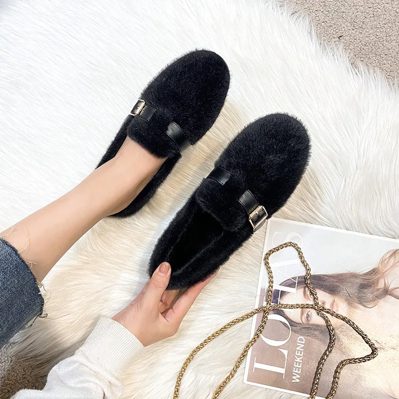 Women's cozy flat shoes with plush faux fur exterior and cushioned lining for stylish warmth