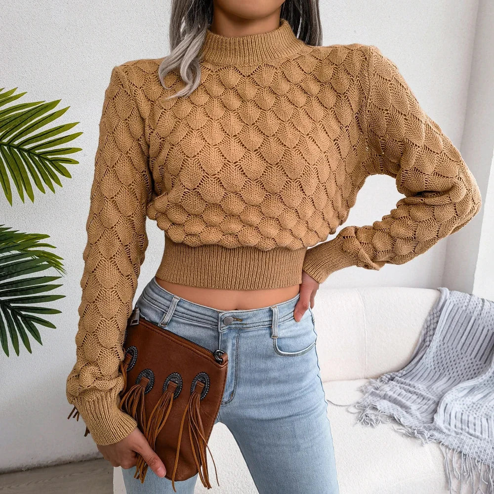 Women's cream bubble texture knit pullover with mock neck, puff sleeves, and relaxed cropped silhouette