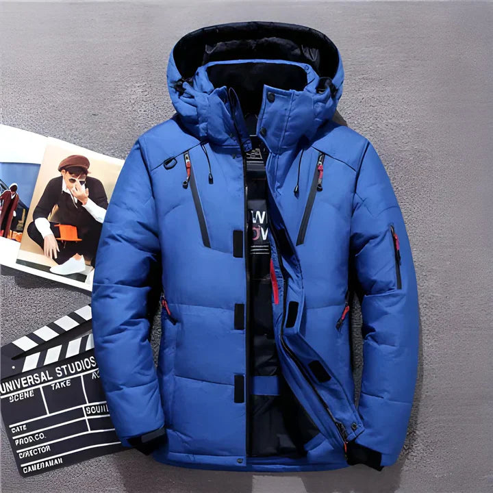 Men's black puffer jacket with hood, longer cut silhouette, and secure zipper pockets for winter