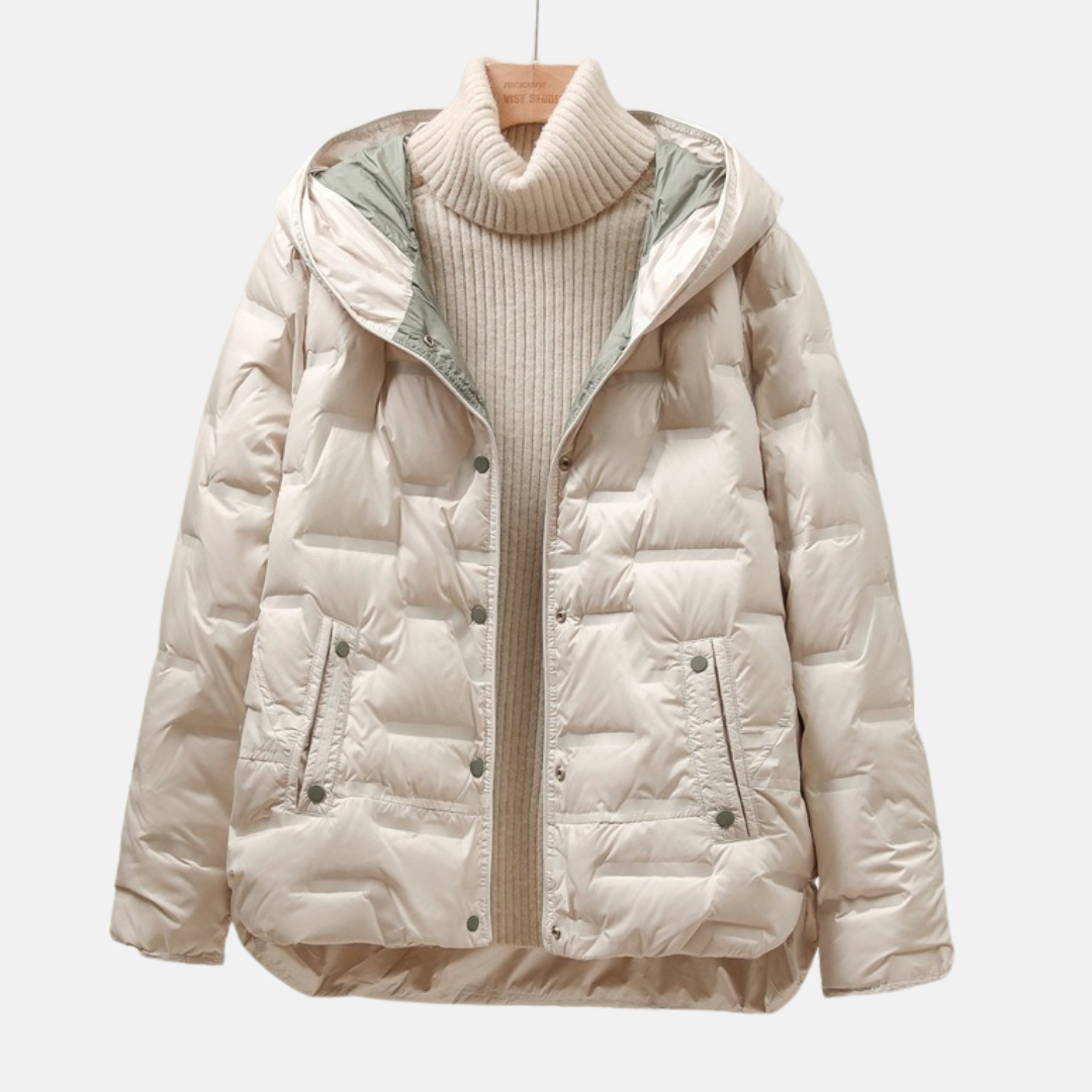 Women's black quilted puff jacket with attached hood and snap button closure relaxed silhouette
