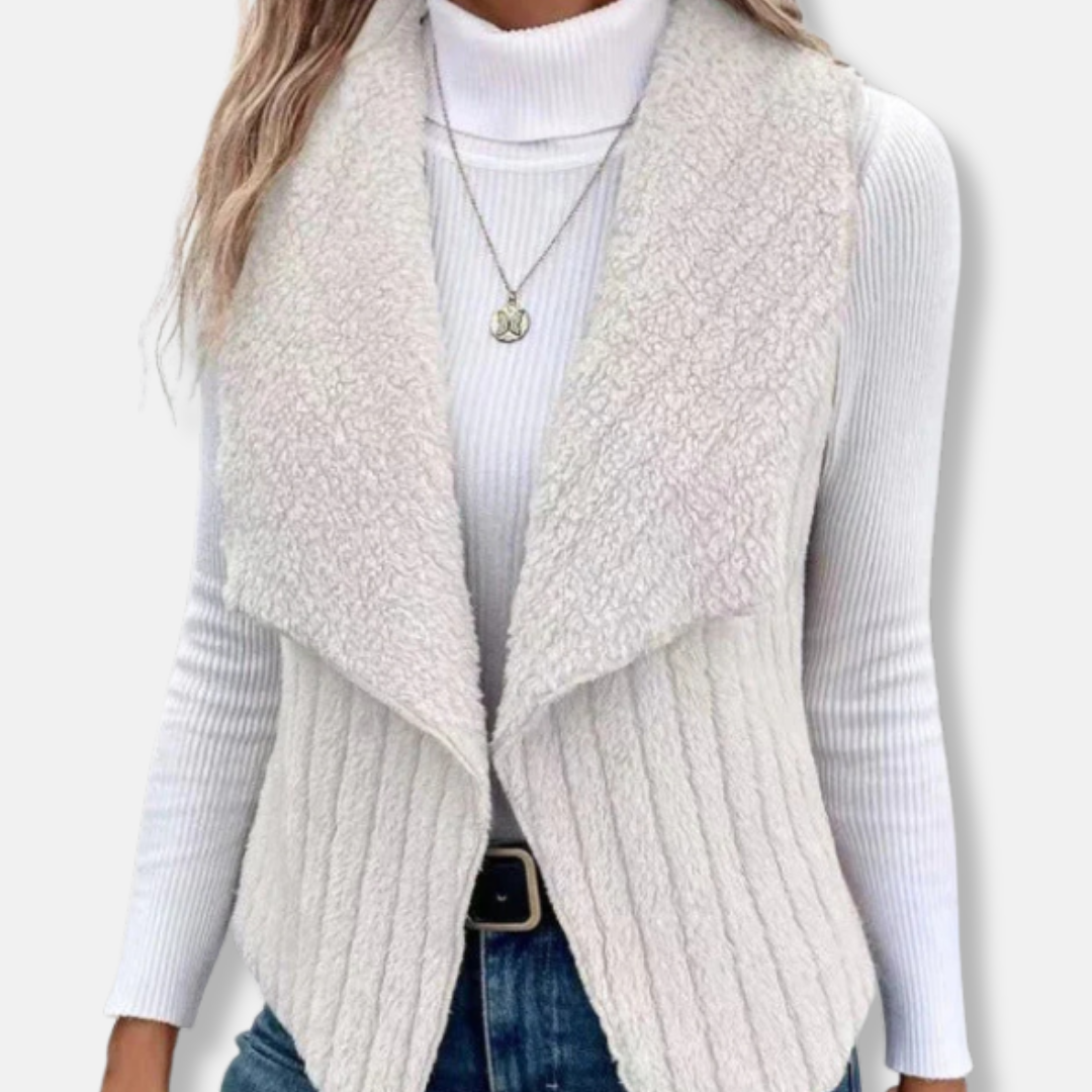 Women's sleeveless knit vest with plush shawl collar, hip-length relaxed open-front silhouette