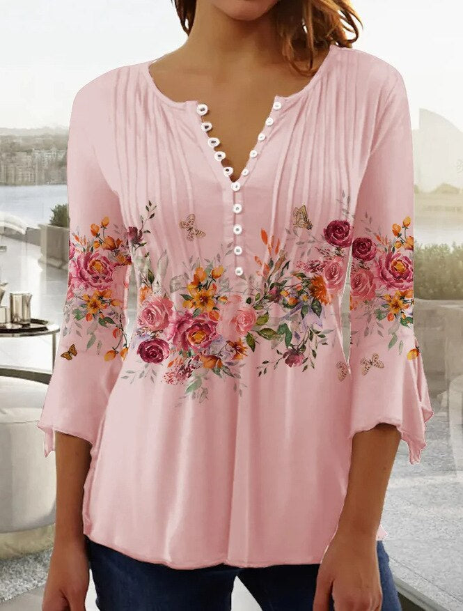 Women's ivory pleated blouse with scalloped V-neckline and front button detail for day-to-evening wear