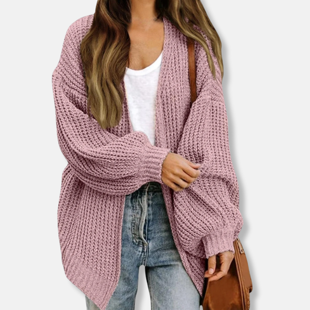 Women's oversized knit cardigan with voluminous lantern sleeves and ribbed cuffs for chic fall layering