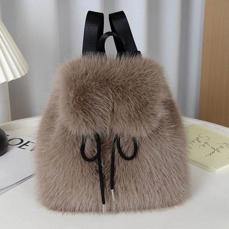 Women's plush faux fur backpack roomy interior drawstring closure magnetic snap fashion-forward