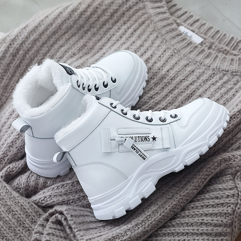 Women's winter lace-up boots with thick sole, padded interior lining for warmth and secure cold-weather traction