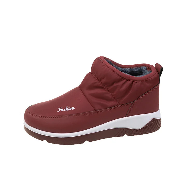 Women's KOZI brown waterproof winter boots with plush fur lining and rugged sole for cold weather