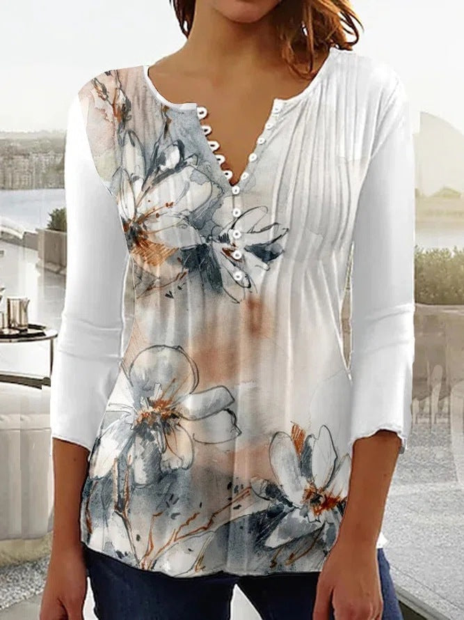 Women's floral print blouse with V-neck and ruching detail, romantic chic feminine fit