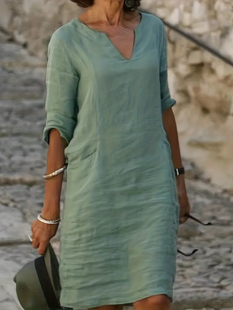 Women's casual relaxed fit three-quarter sleeve dress in versatile solid color, easy-care fabric