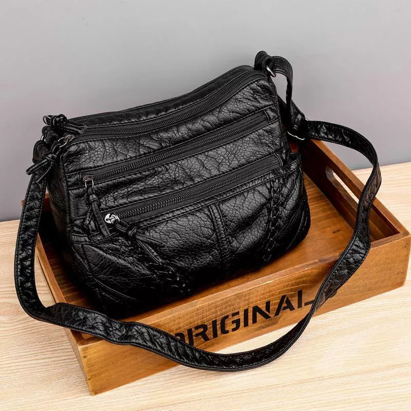 Eloura-Moda soft structured women's bag elegant chic silhouette versatile everyday and occasions use