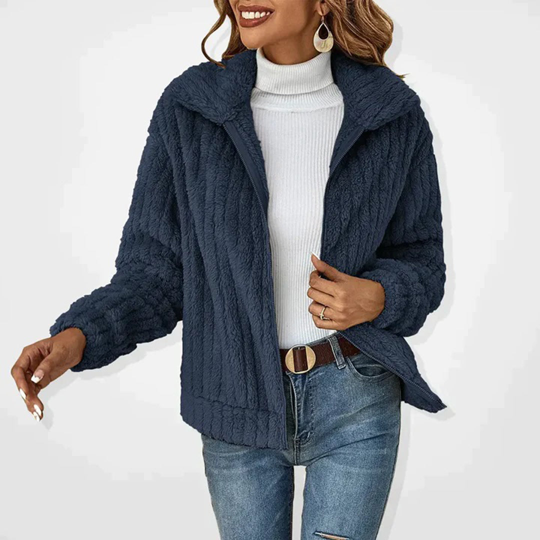 Women's navy zippered winter jacket with high collar, modern slim fit and premium softness