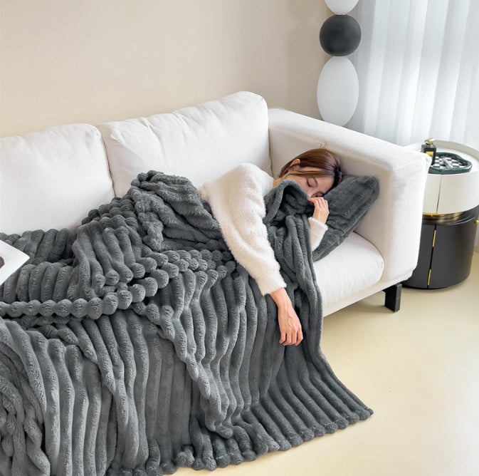 Cozy ultra-soft plush fleece blanket in neutral tones, oversized warmth for sofa and bed winter use
