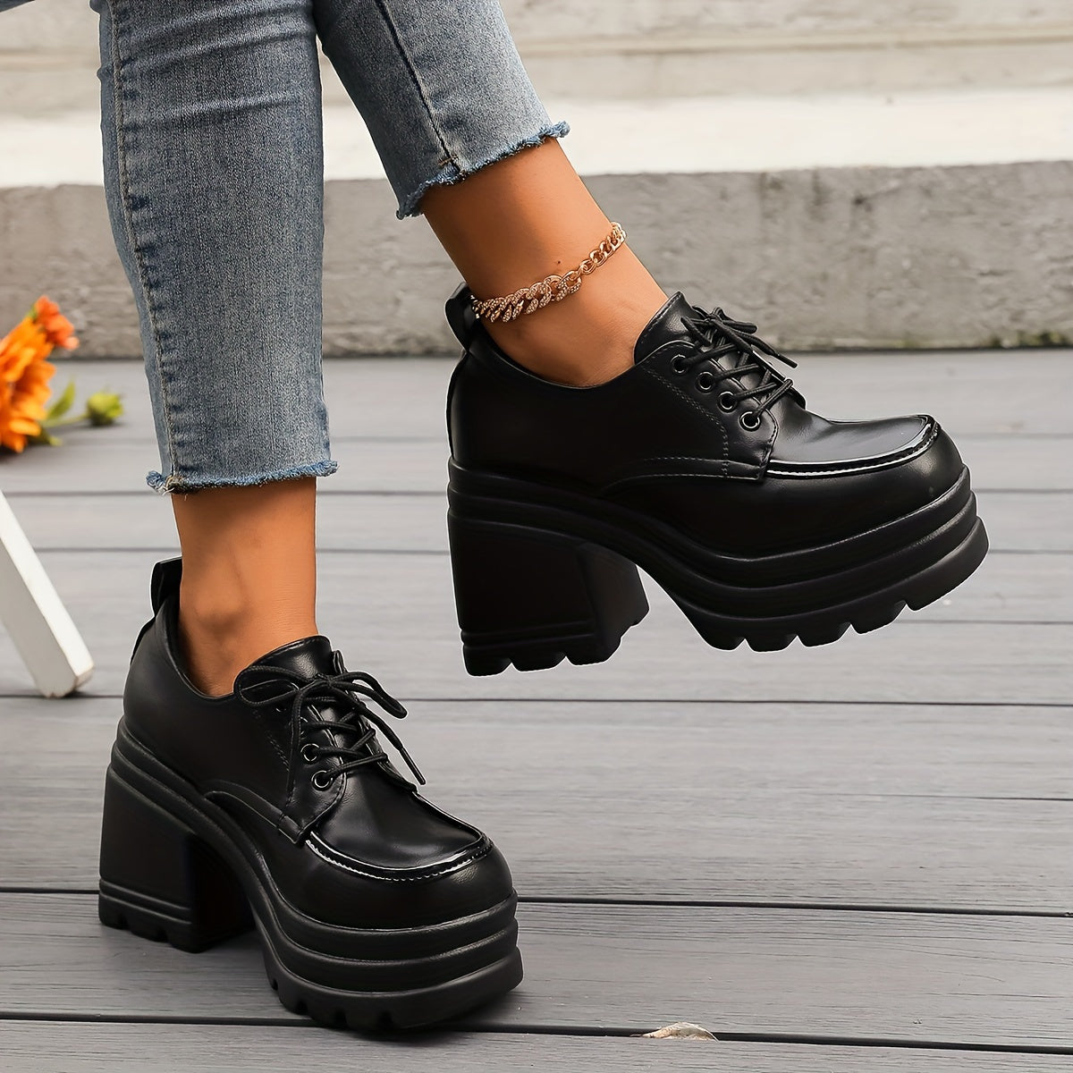 Women's black chunky platform oxford shoes with lace-up design and sturdy block heel