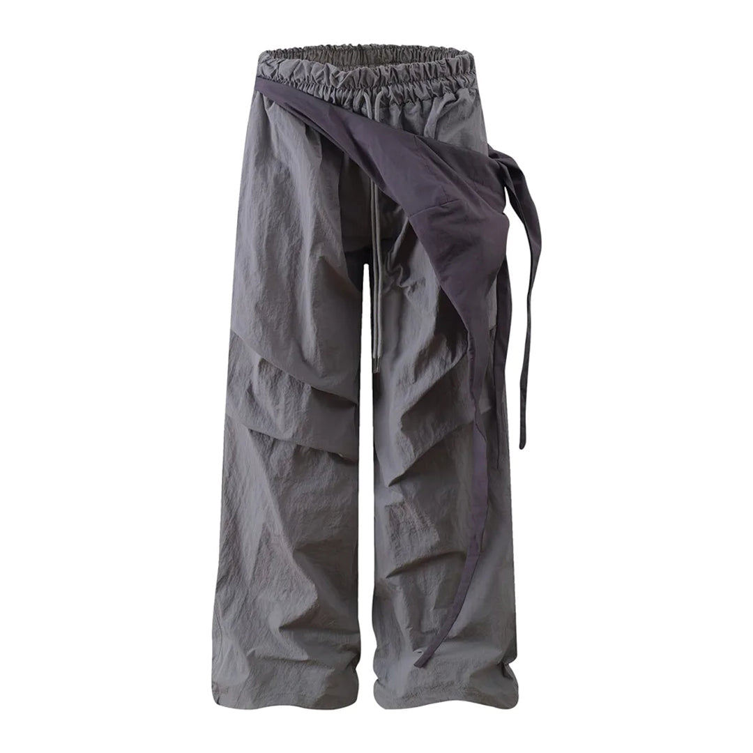 Black wide-leg cargo trousers water-repellent nylon relaxed fit with adjustable lace-up overlay