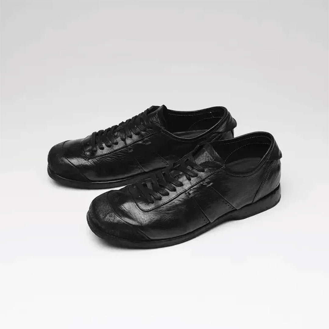 White low-top court sneaker microfiber upper vegan leather accents minimal urban style