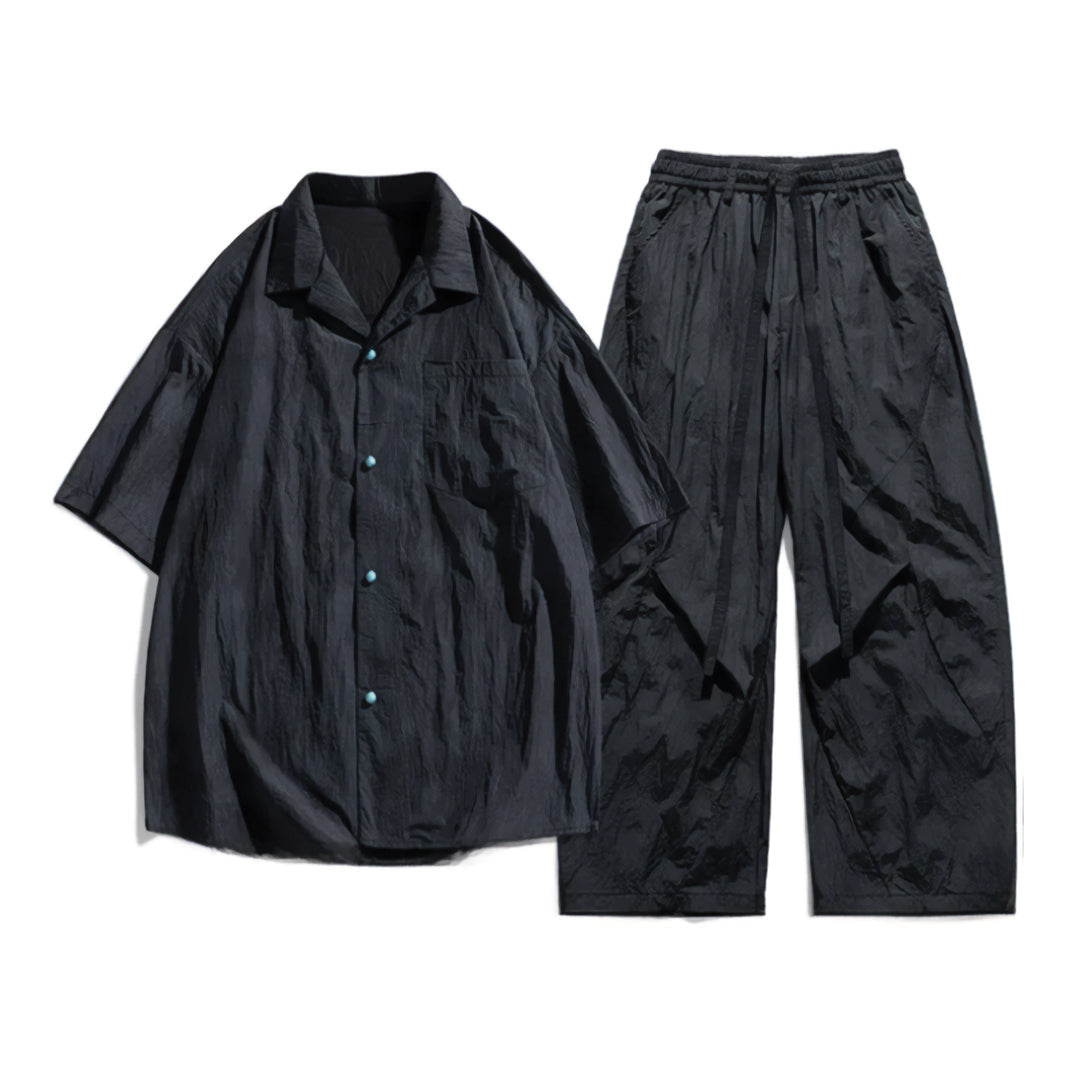 Turquoise nylon two-piece set with elastic waistband and matching button accents for women