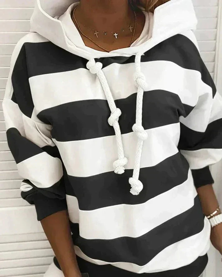 Lara unisex hoodie in neutral tone, relaxed cozy fit with timeless layerable silhouette for all seasons