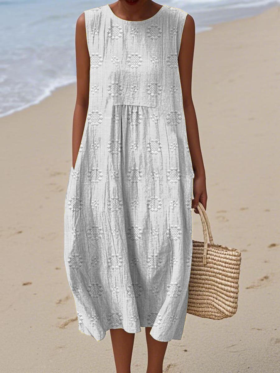 Women's textured midi dress with gathered waist, sleeveless breezy silhouette in circular print motifs