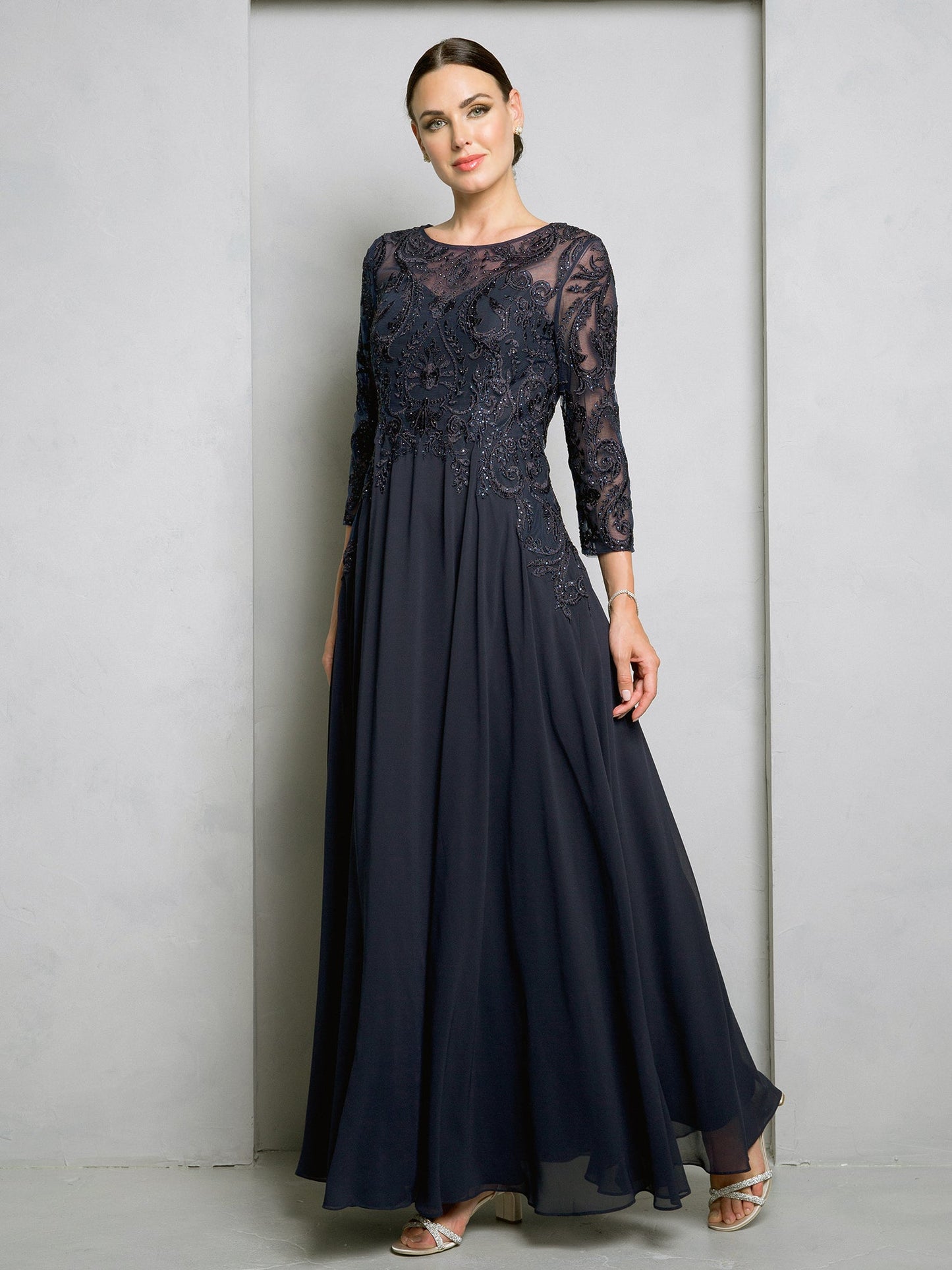 Elegant A-line chiffon mother of bride gown with embroidered lace bodice and three-quarter sleeves