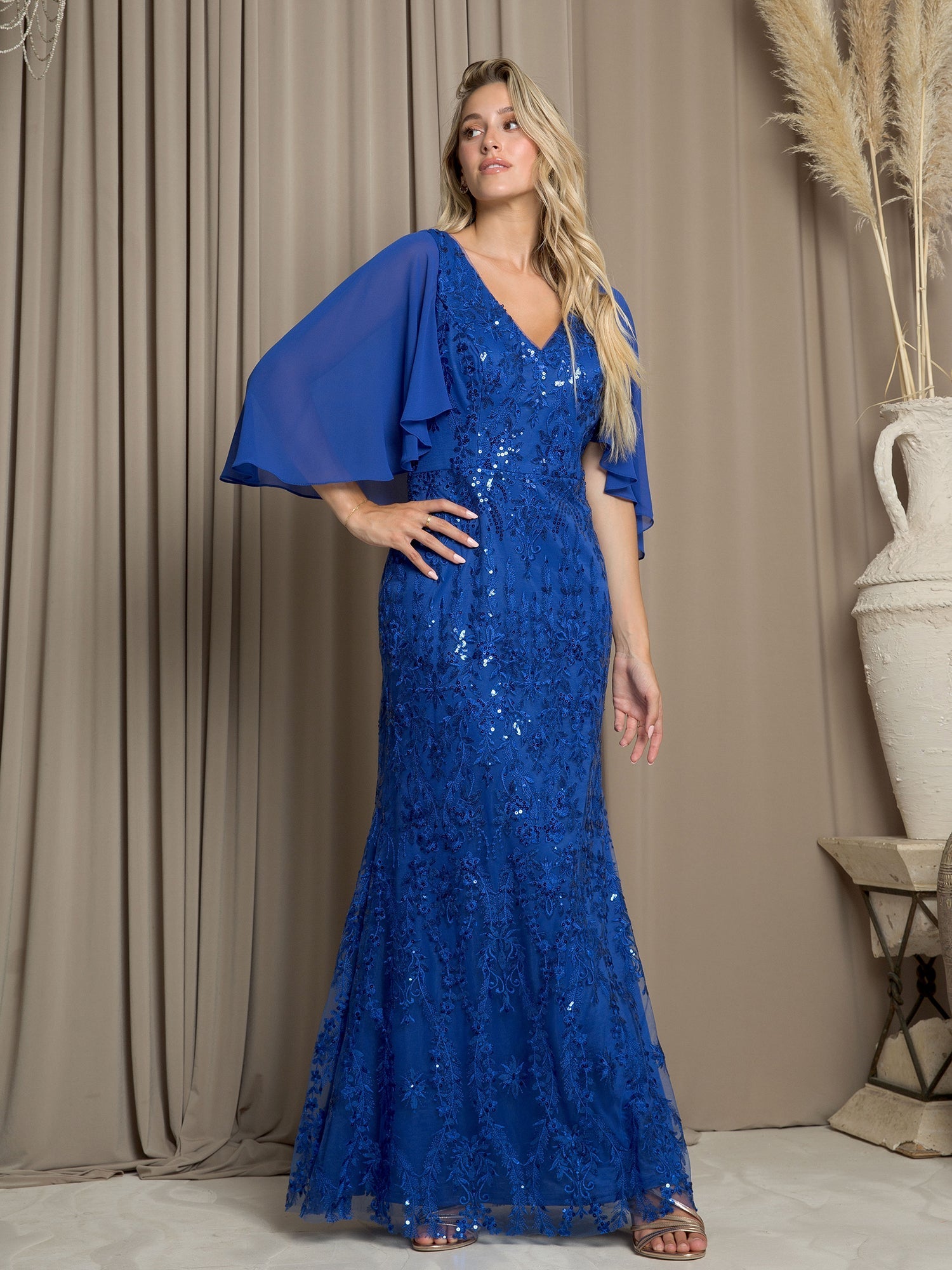 Long formal sequin mesh mother of the bride dress with flowing chiffon cape overlay, elegant sparkle