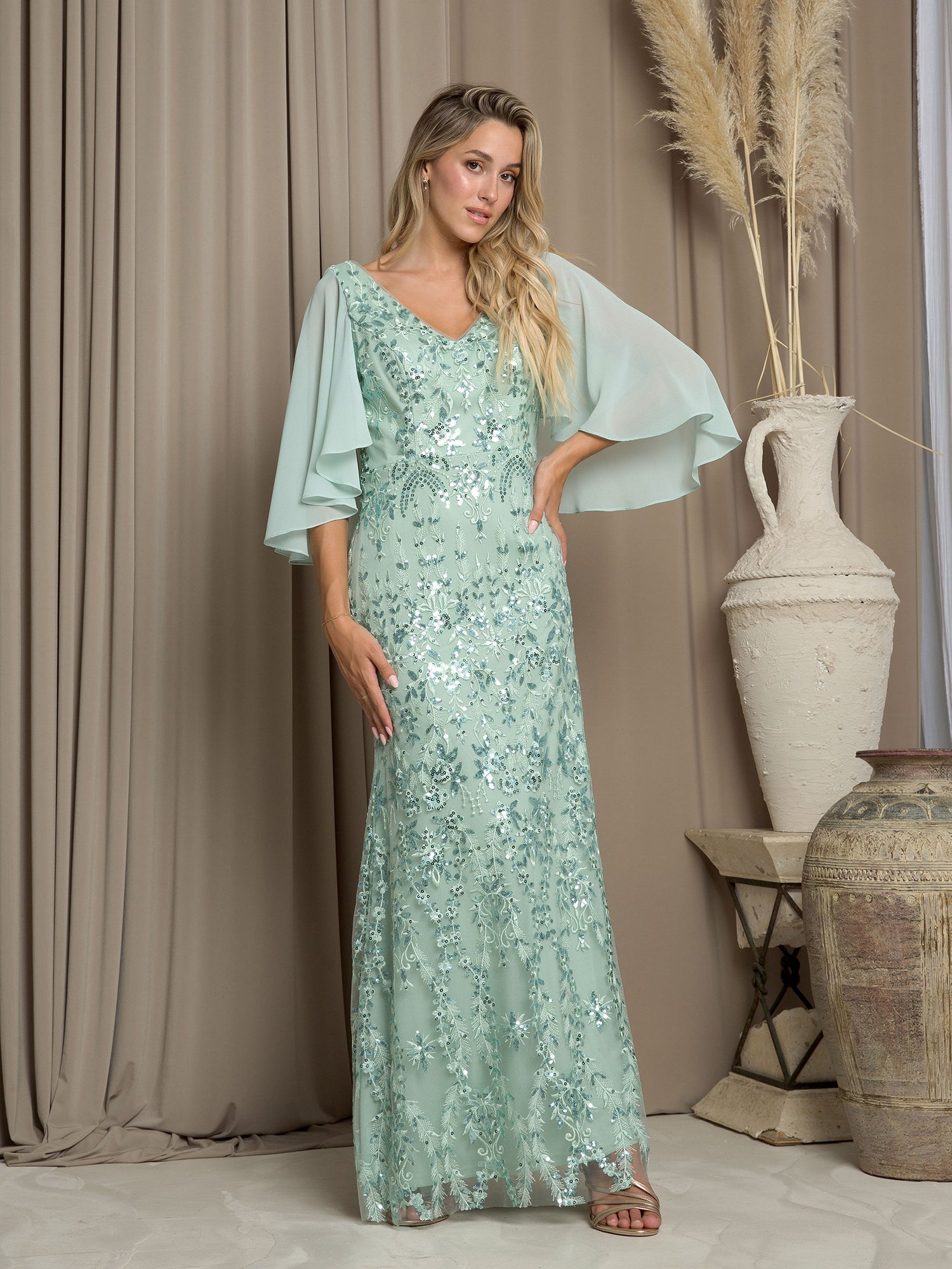 Long formal sequin mesh mother of the bride dress with flowing chiffon cape overlay, elegant sparkle