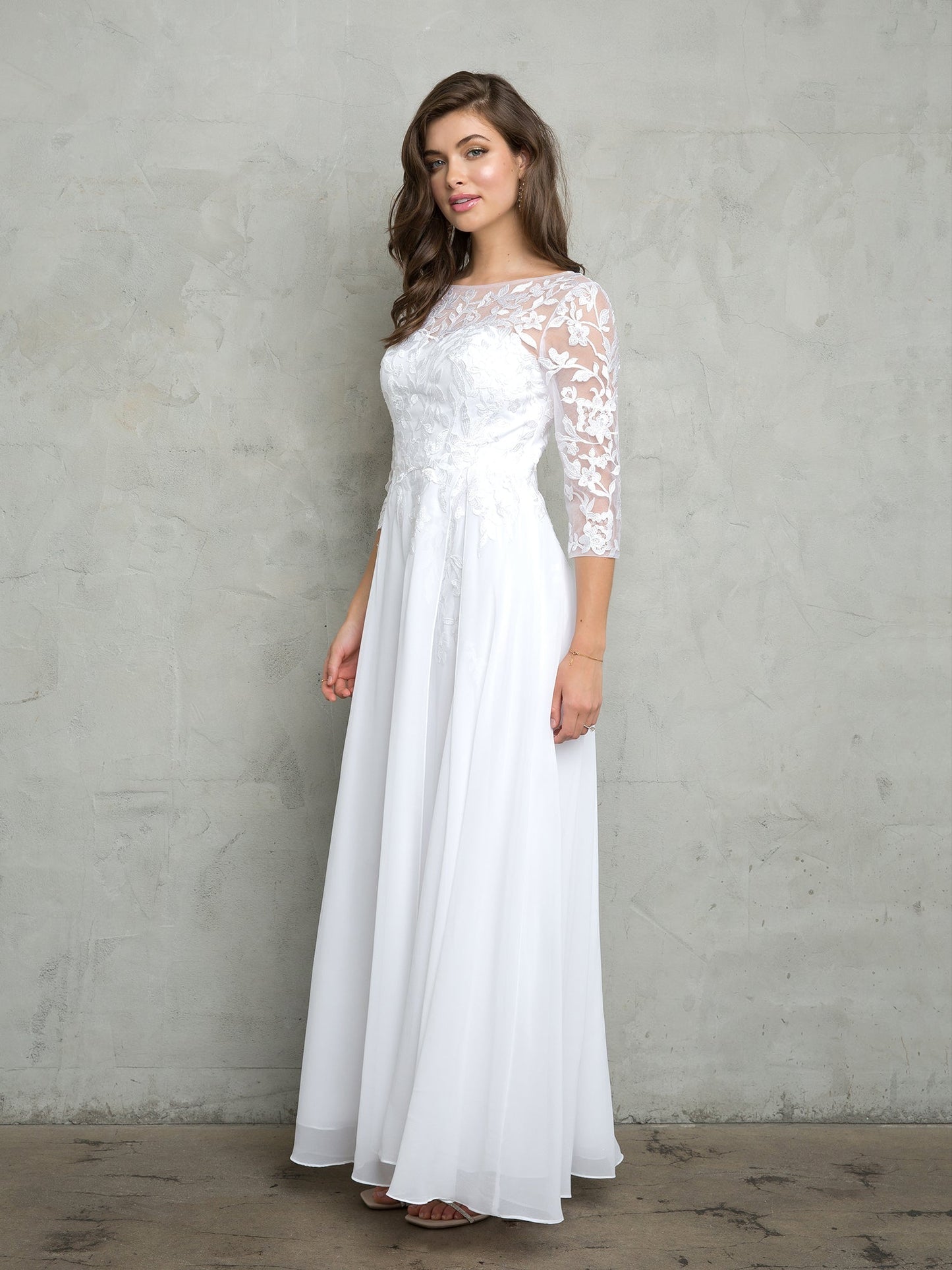 Long A-line chiffon mother of the bride dress with embellished bodice and three-quarter sleeves