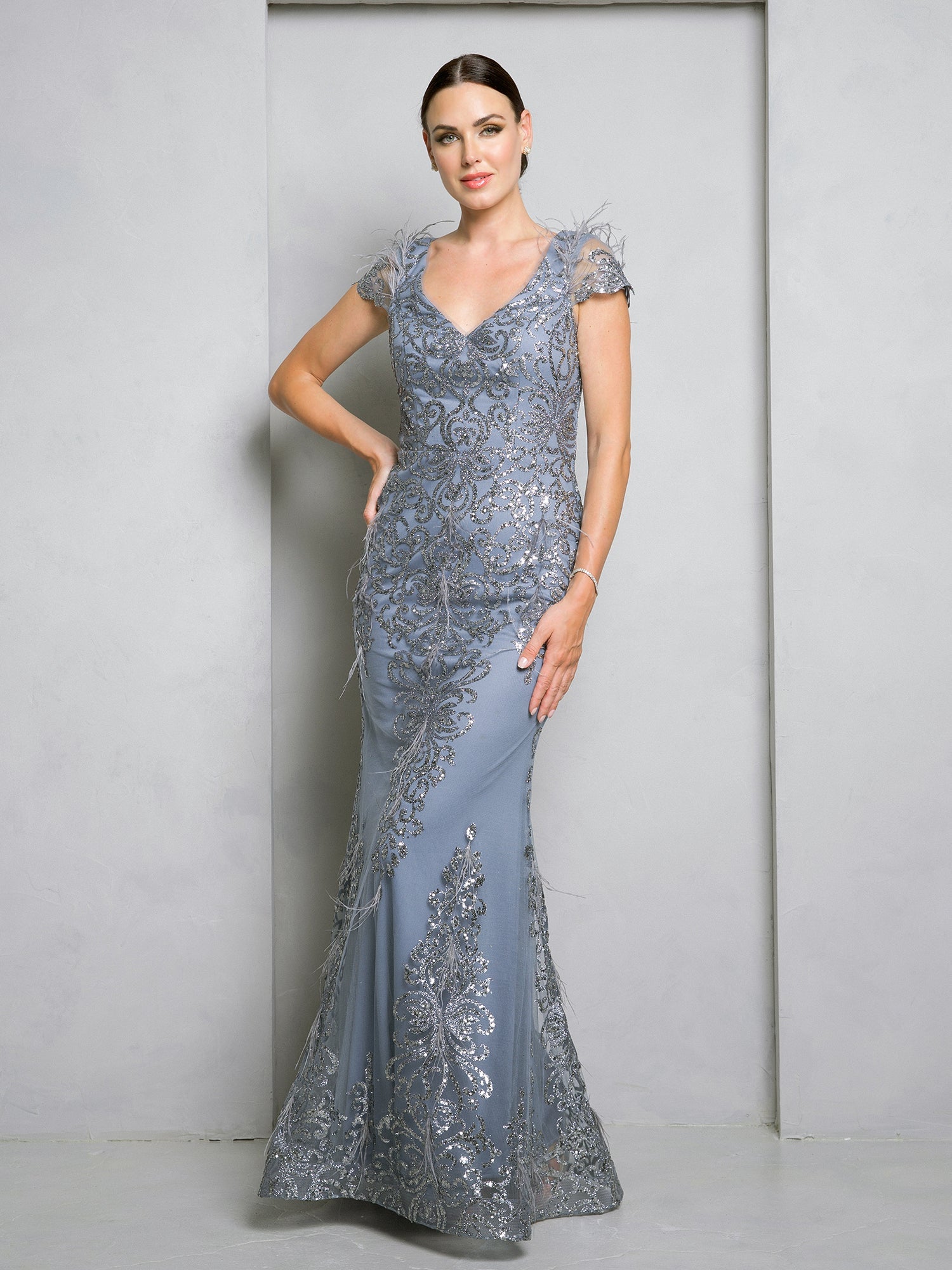 Long formal glitter sheath evening gown with lace appliqués and cap sleeves for elegant occasions