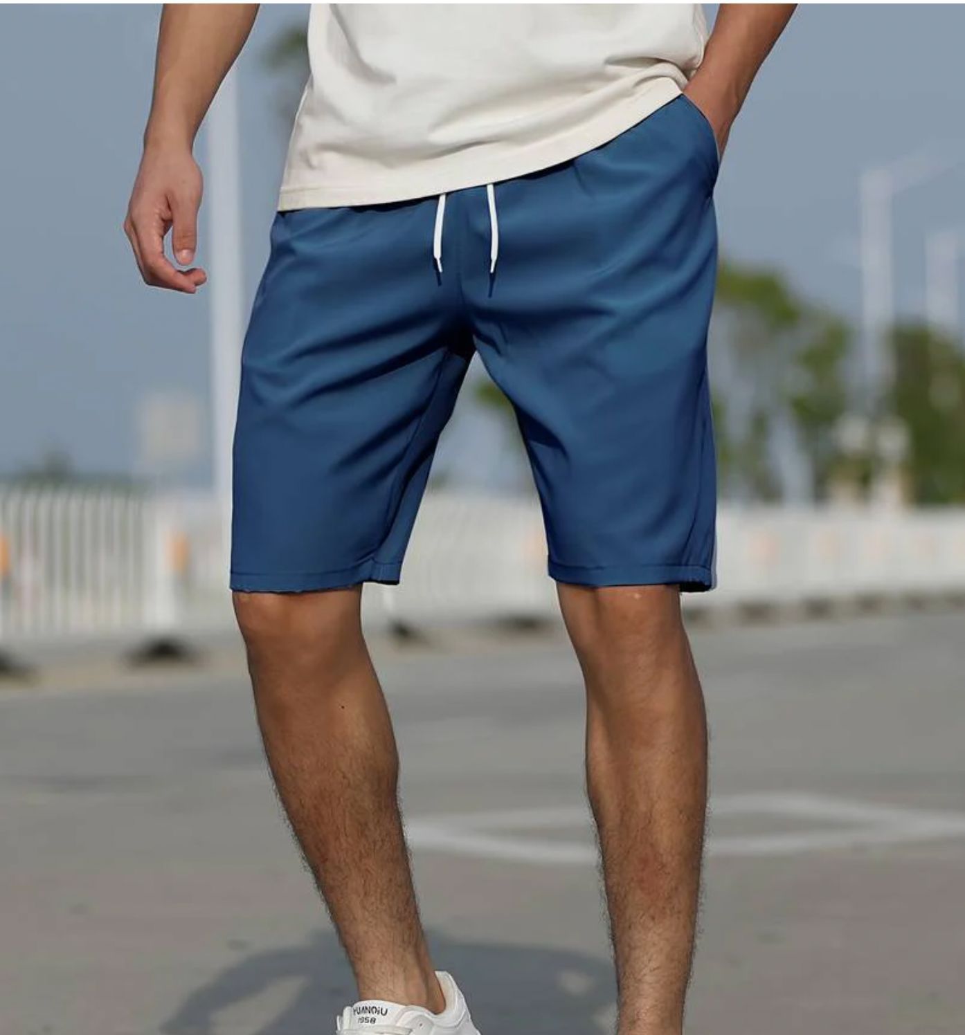 Men's mint green quick-dry swim shorts elastic waist mid-thigh cut lightweight versatile beach pool