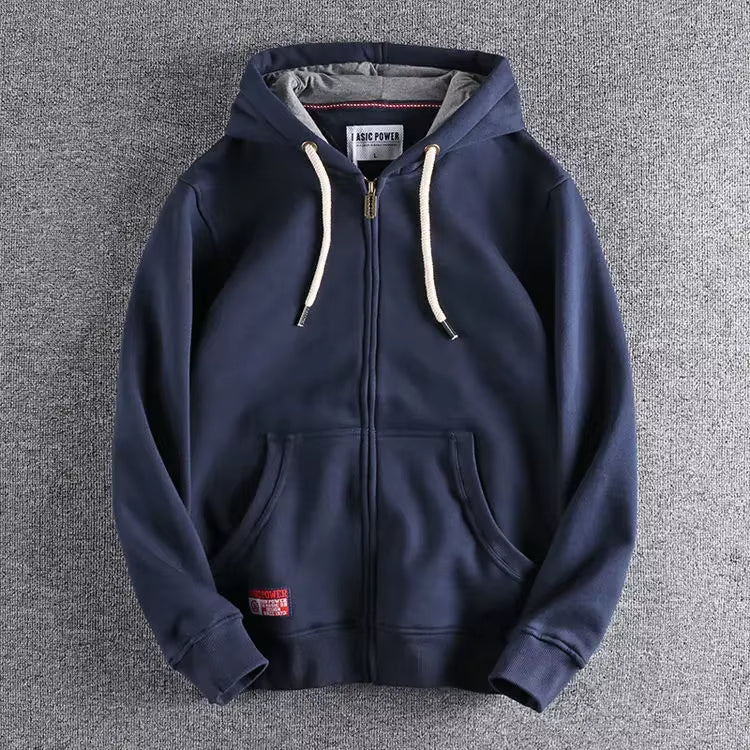 Heavyweight zip hoodie in fade-resistant color, cotton-polyester blend with reinforced stitching for active wear