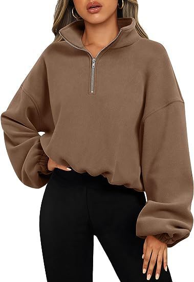 Women's relaxed fit half-zip sweatshirt with stand-up collar for sporty street style comfort