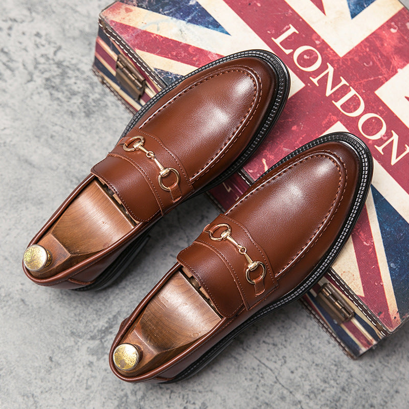 Black leather men's slip-on loafers with gold horsebit buckle, sleek professional style