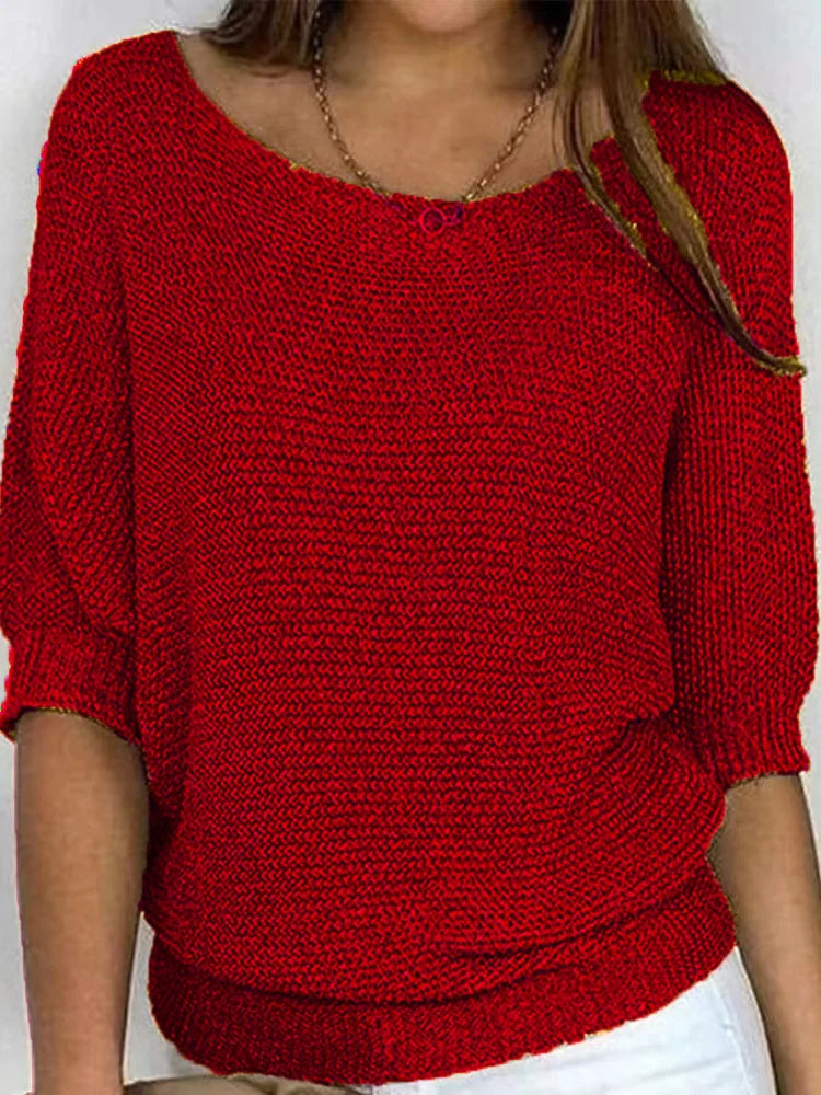 Women's cozy loose-fit knitted sweater with elbow sleeves and boat neckline for casual layering