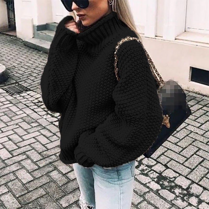 Women's chunky knit turtleneck sweater in cozy oversized fit with thick textured weave for winter warmth