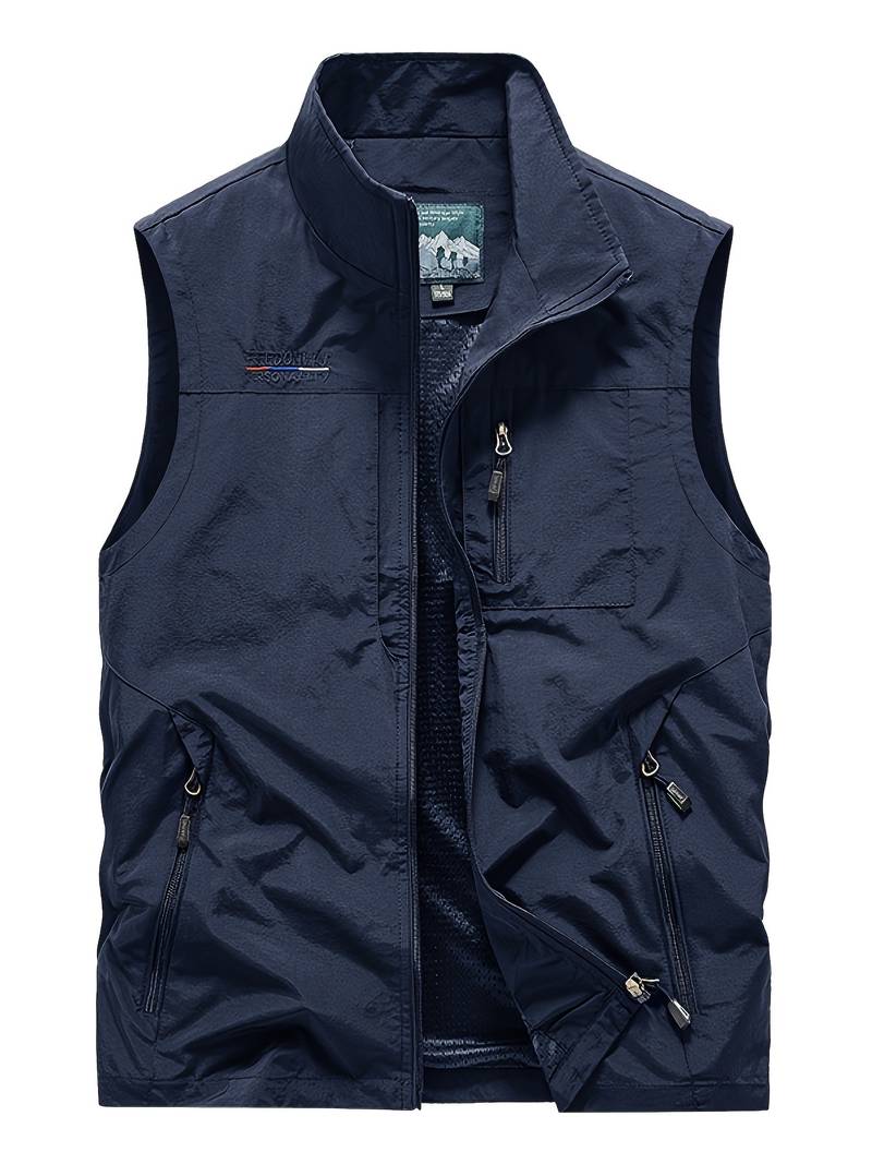 Men's olive cargo vest with zippered pockets, durable outdoor layering piece for active wear