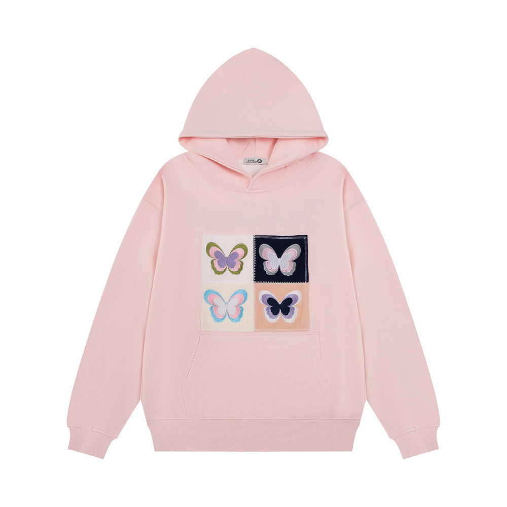 Women's cozy hoodie with embroidered butterfly patch, casual streetwear style in soft warm fabric