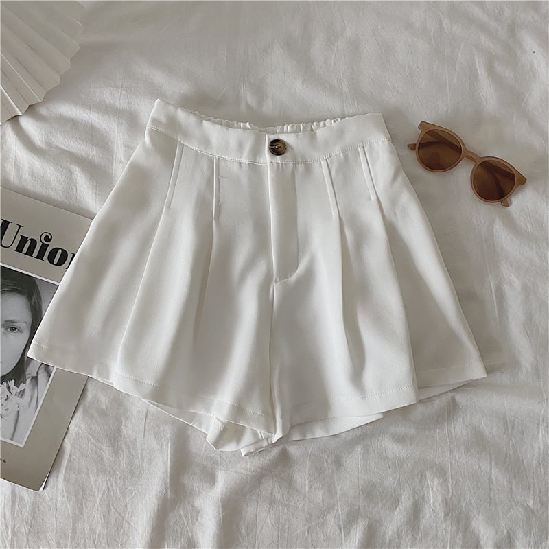 Women's high waist pleated wide-leg shorts in neutral tones, elegant casual summer style