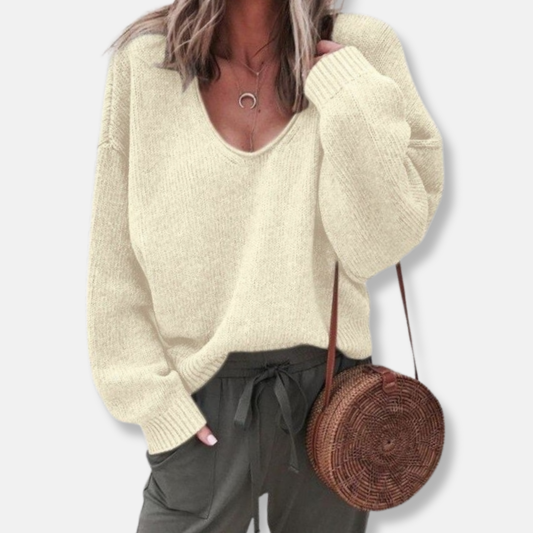 Women's relaxed fit deep V-neck knit sweater in soft wool blend, cozy everyday style for fall winter