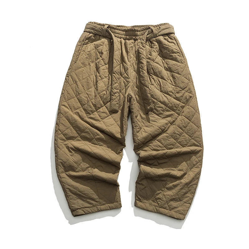 Gray wide-leg fleece patch pants with quilted texture and bold oversized pockets for streetwear