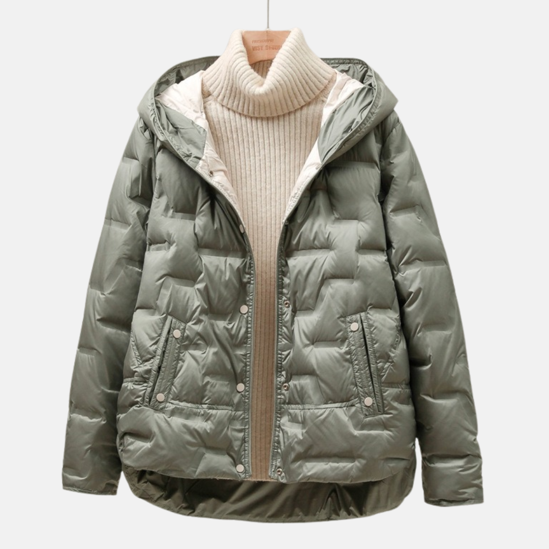 Women's black quilted puff jacket with attached hood and snap button closure relaxed silhouette