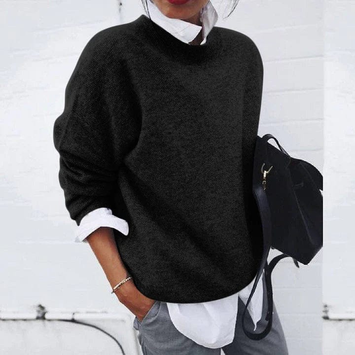 Relaxed crewneck knit sweater in neutral tones with soft texture and effortless everyday layering fit
