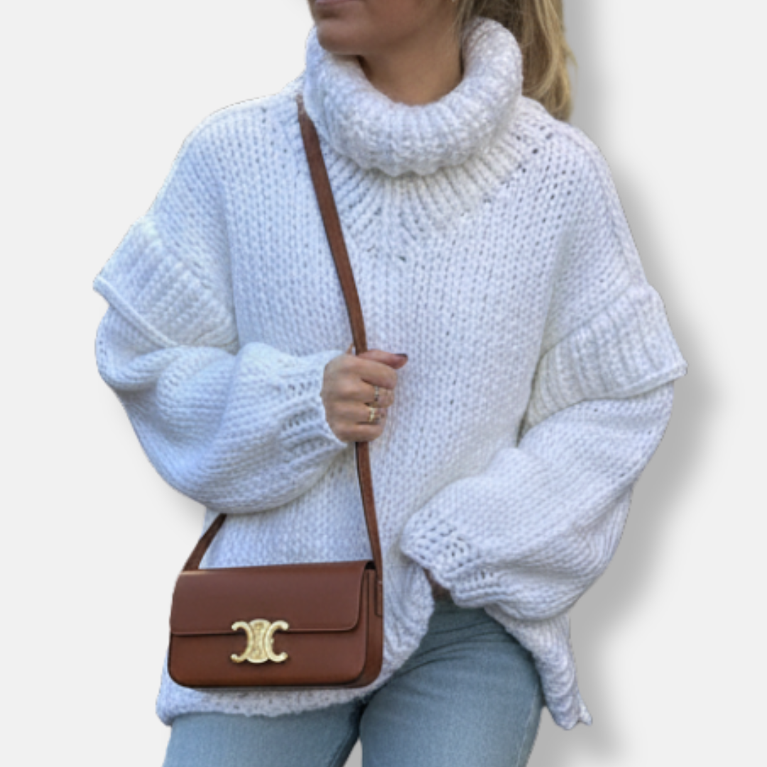 Women's oversized chunky knit wool turtleneck pullover sweatshirt in cozy neutral tones