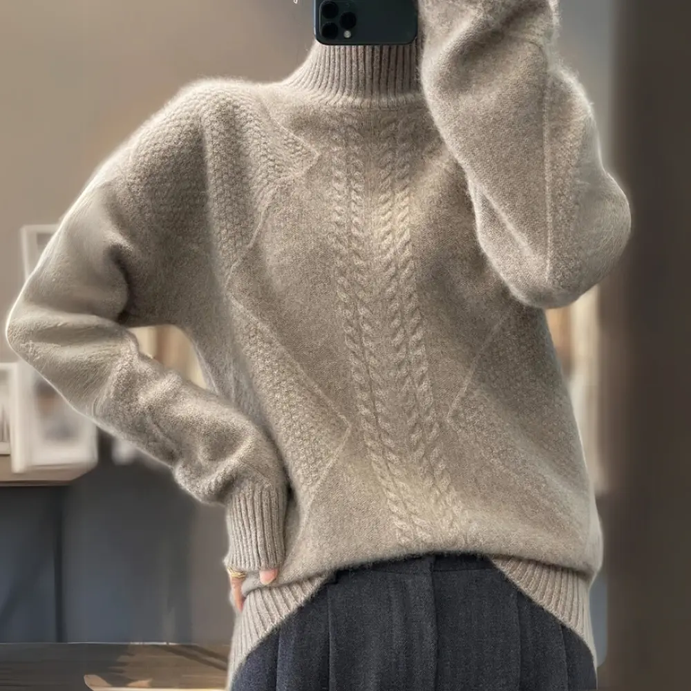 Women's contoured turtleneck sweater with subtle textured patchwork pattern in soft premium knit